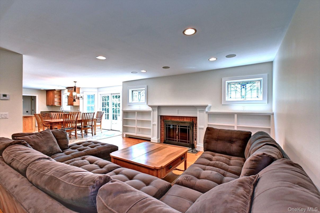 Dining room, Fireplace, Interior, Living room, Pendant Lights, Recessed Lighting, Wood Texture Flooring