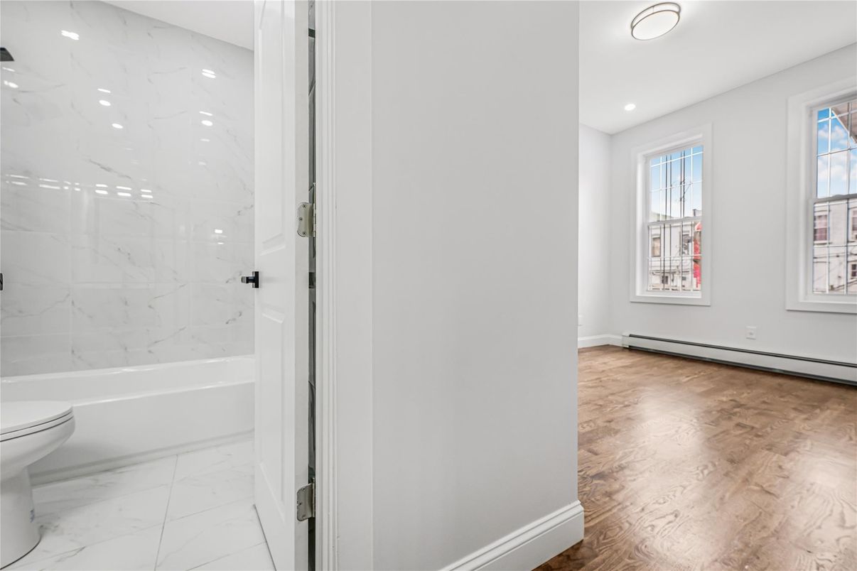 Bathroom, Interior, Marble, Marble Walls, Recessed Lighting, Wood Texture Flooring