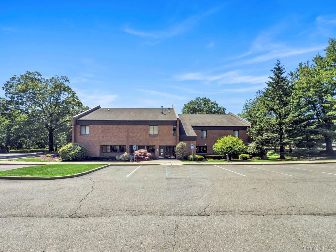 Exterior, Facade, Brick Facade, Log Home
