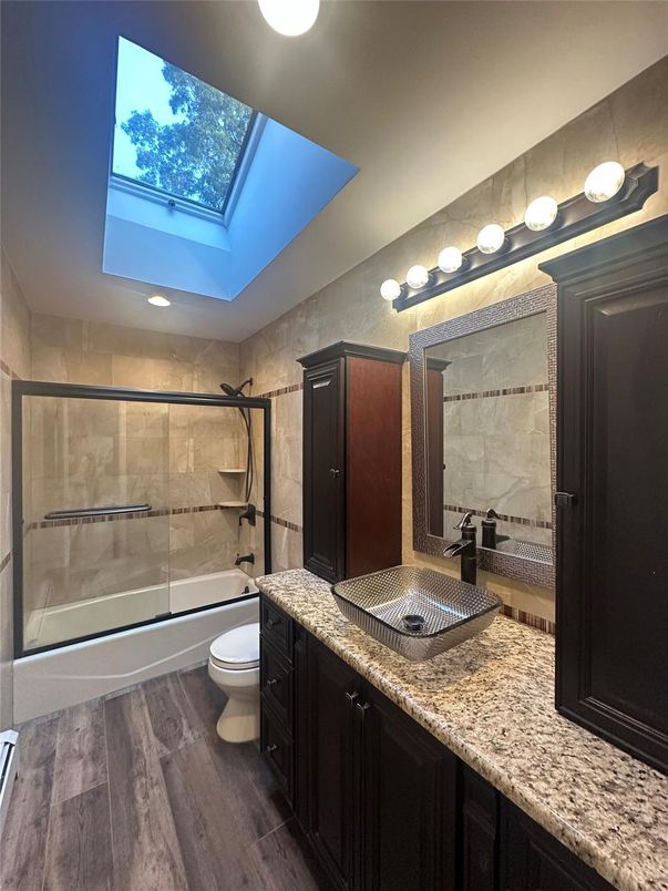 Bathroom, Glass Ceilings, Glass Shower, Interior, Recessed Lighting, Wood Texture Flooring