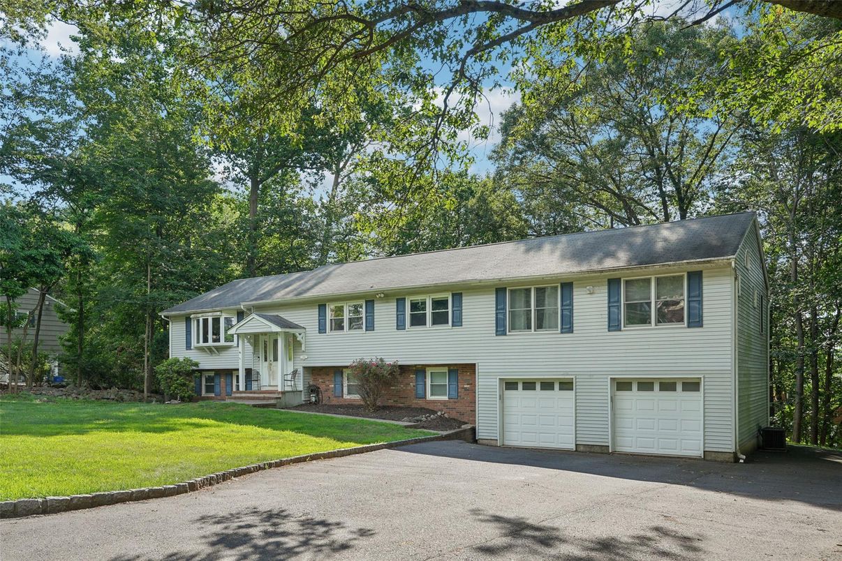 Attached, Exterior, Facade, Raised Ranch