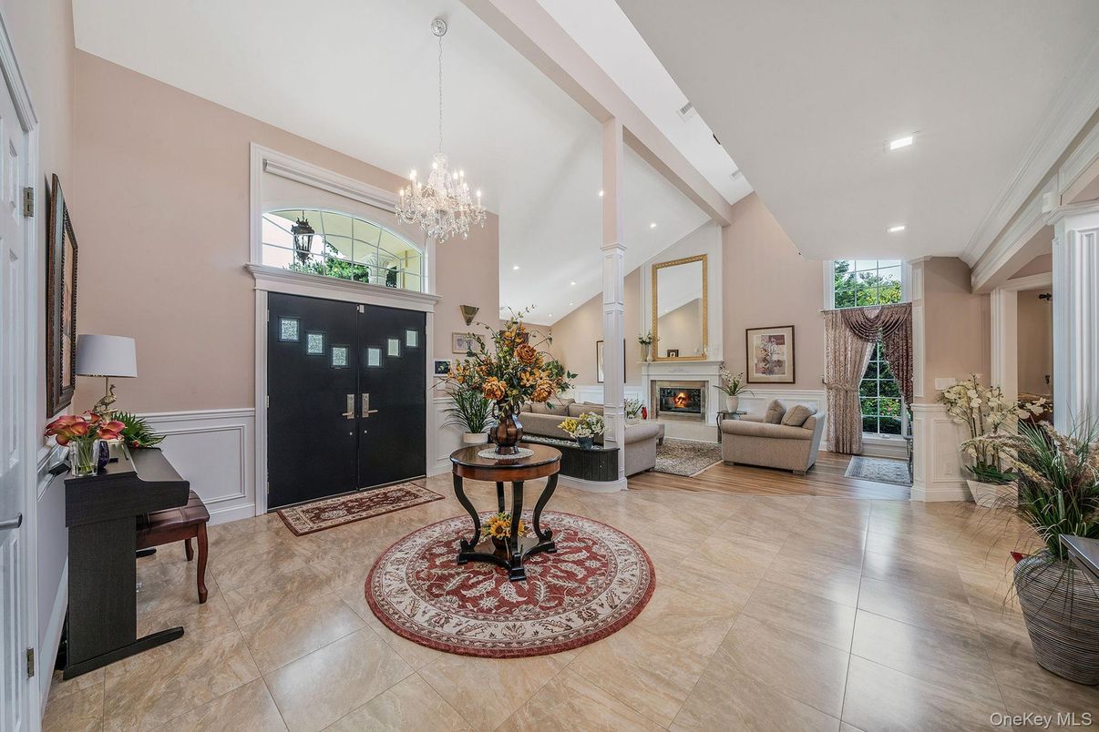 Chandelier, Fireplace, Interior, Living room, Piano, Recessed Lighting