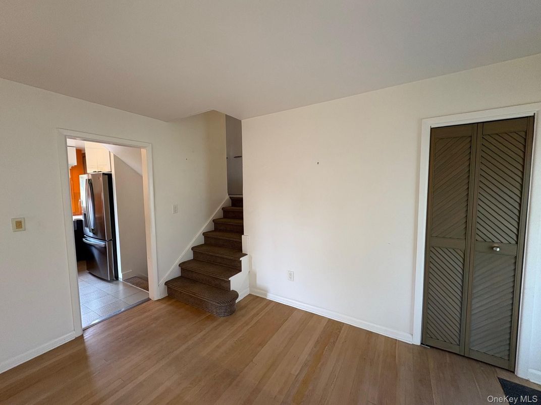 Empty room, Interior, Kitchen, Stainless Steel Appliances, Wood Texture Flooring