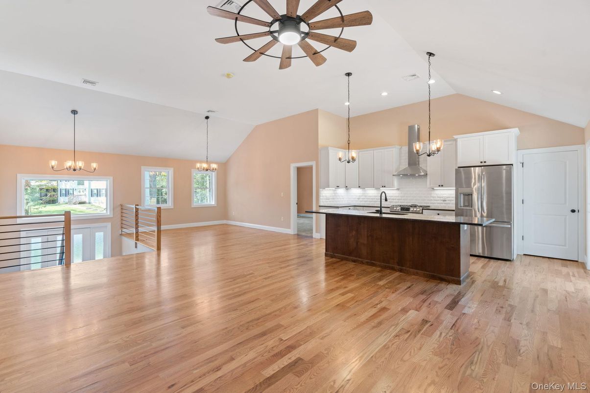 Chandelier, Dining room, Interior, Kitchen, Pendant Lights, Recessed Lighting, Stainless Steel Appliances, Wood Texture Flooring
