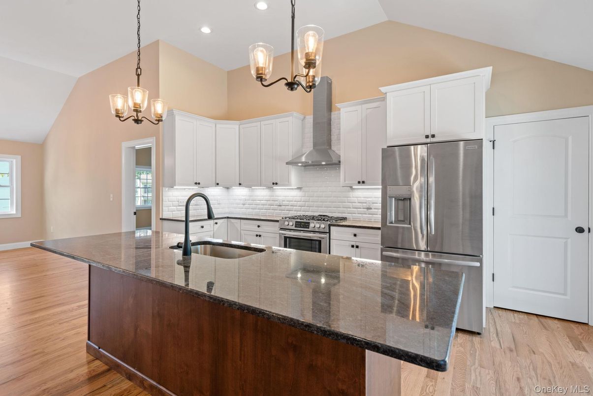 Chandelier, Interior, Kitchen, Pendant Lights, Recessed Lighting, Stainless Steel Appliances, Wood Texture Flooring