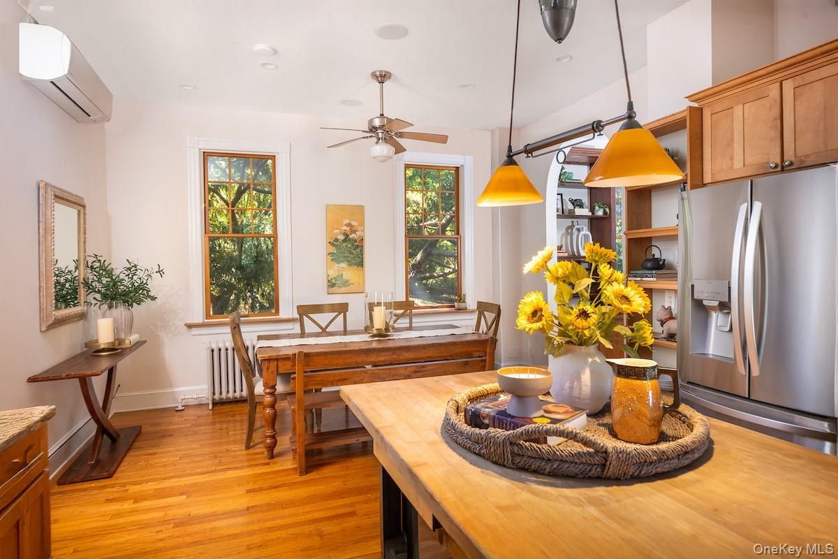 Dining room, Interior, Kitchen, Pendant Lights, Recessed Lighting, Stainless Steel Appliances, Wood Texture Flooring