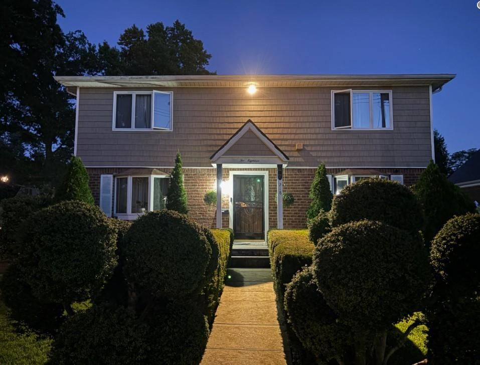 Exterior, Facade, Brick Facade, Raised Ranch
