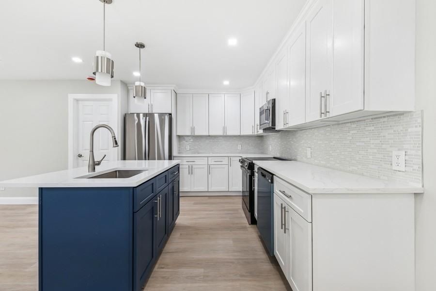 Interior, Kitchen, Pendant Lights, Recessed Lighting, Stainless Steel Appliances, Wood Texture Flooring