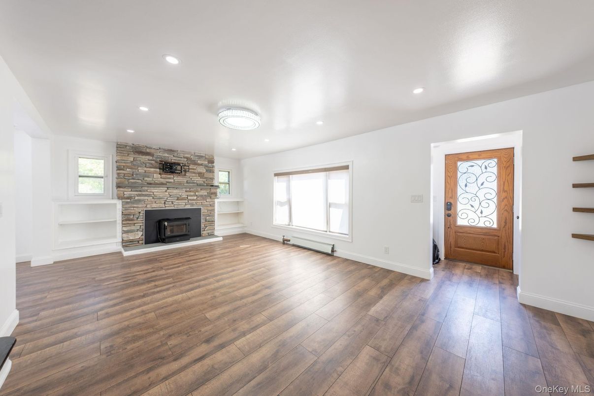 Empty room, Fireplace, Interior, Recessed Lighting, Wood Texture Flooring
