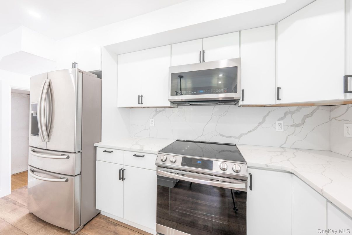 Interior, Kitchen, Marble Walls, Stainless Steel Appliances, Wood Texture Flooring