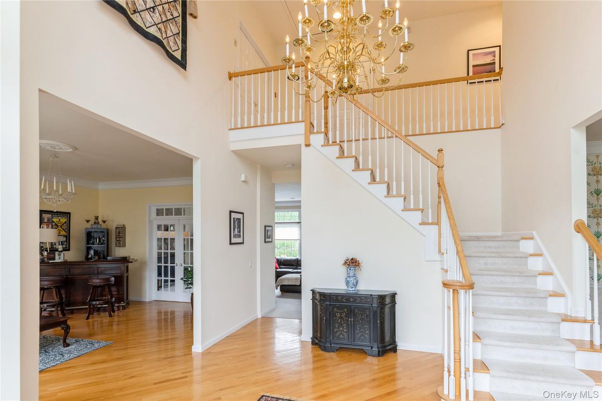 Chandelier, Dining room, Interior, Piano, Wood Texture Flooring