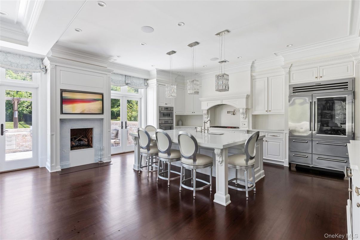 Fireplace, Interior, Kitchen, Pendant Lights, Recessed Lighting, Stainless Steel Appliances, Wood Texture Flooring