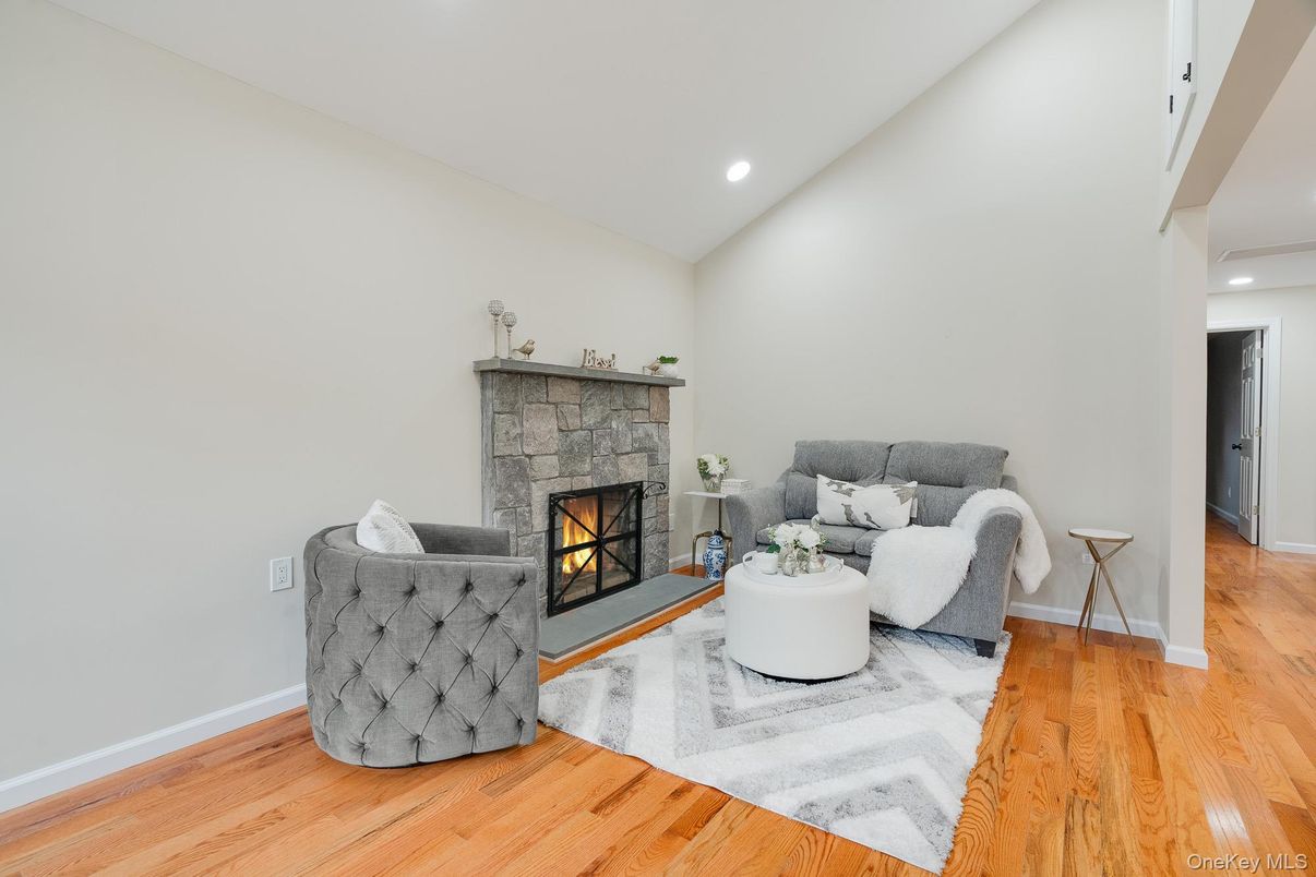Fireplace, Interior, Living room, Recessed Lighting, Wood Texture Flooring