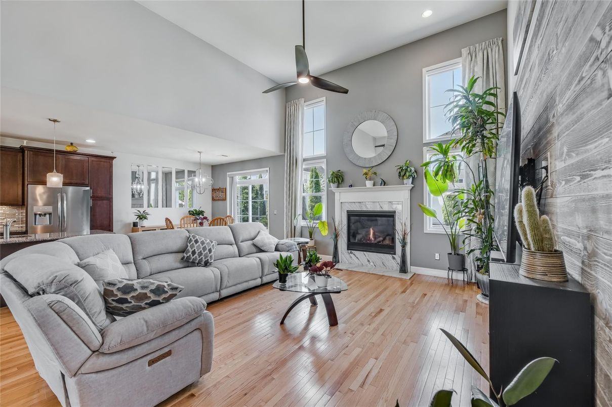 Dining room, Fireplace, Interior, Kitchen, Living room, Pendant Lights, Recessed Lighting, Stainless Steel Appliances, Wood Texture Flooring