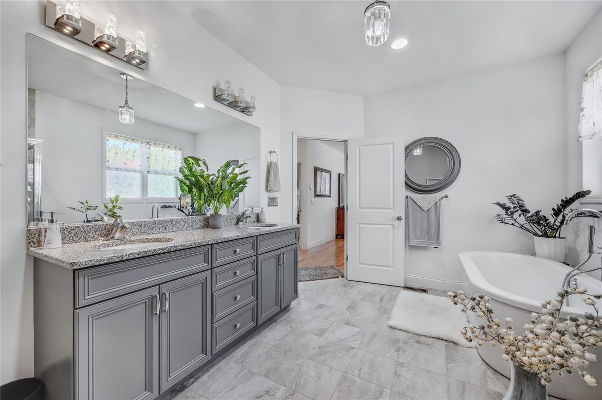 Bathroom, Dual Sink Vanities, Interior, Marble, Pendant Lights, Recessed Lighting, Wood Texture Flooring