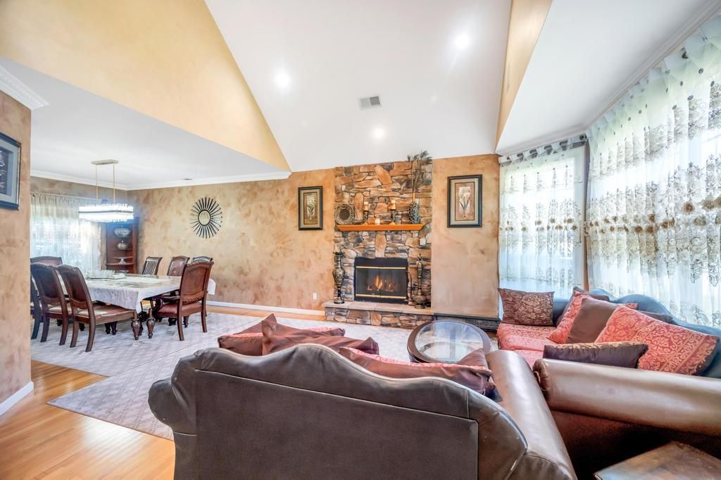 Dining room, Fireplace, Interior, Living room, Pendant Lights, Recessed Lighting, Stone Walls, Wood Texture Flooring