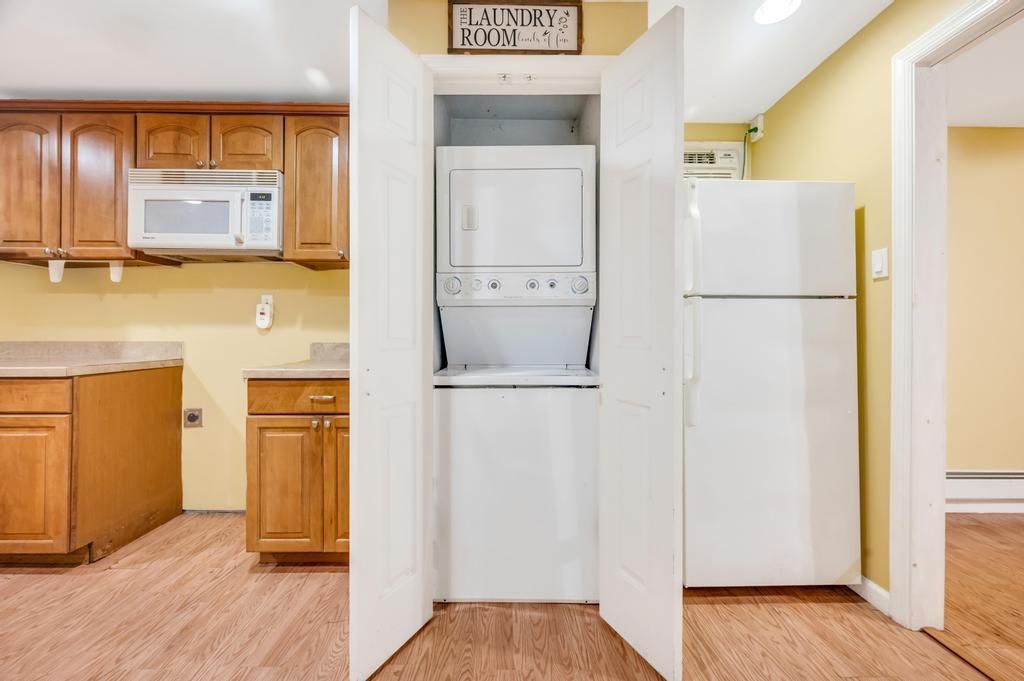 Interior, Kitchen, Recessed Lighting, Utility Closets, Washer, Wood Texture Flooring
