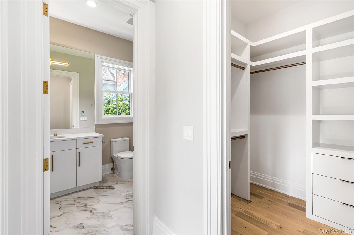 Bathroom, Interior, Marble, Recessed Lighting, Walk-in Closets, Wood Texture Flooring