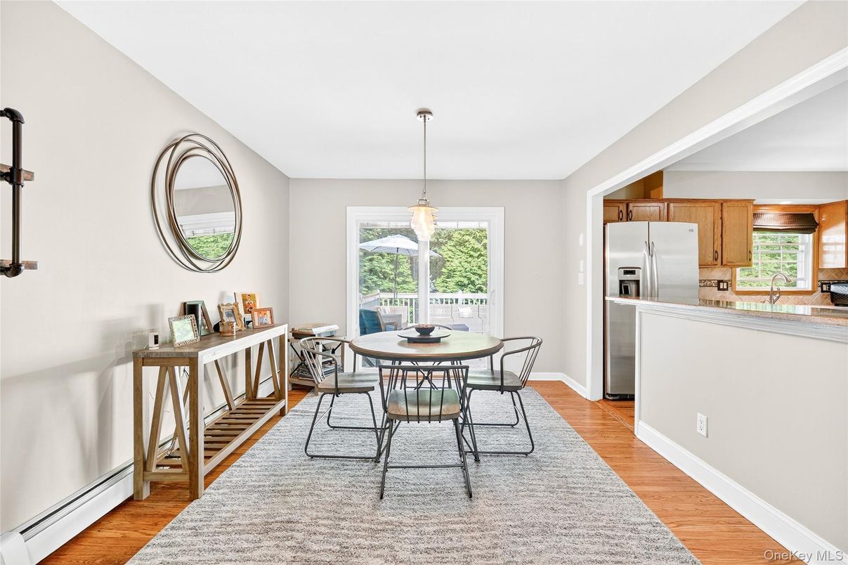 Dining room, Interior, Kitchen, Pendant Lights, Stainless Steel Appliances, Wood Texture Flooring