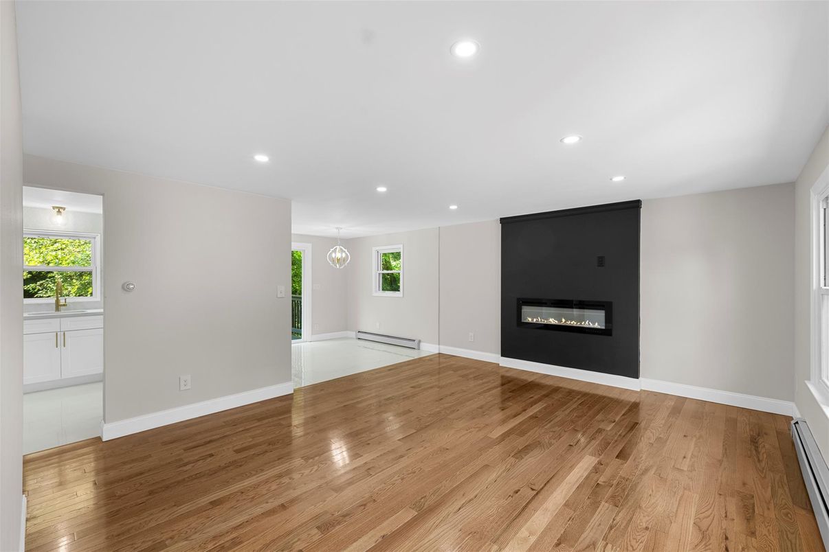 Empty room, Fireplace, Interior, Pendant Lights, Recessed Lighting, Wood Texture Flooring