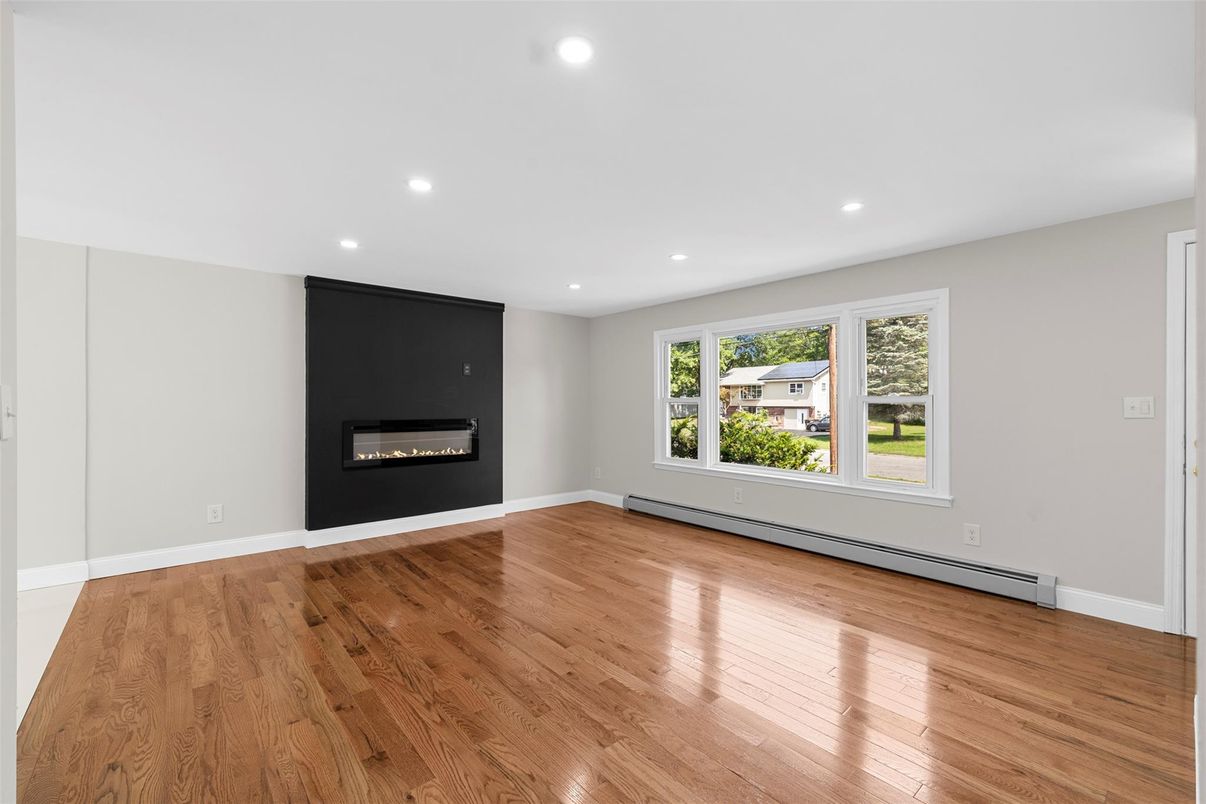 Empty room, Fireplace, Interior, Recessed Lighting, Wood Texture Flooring