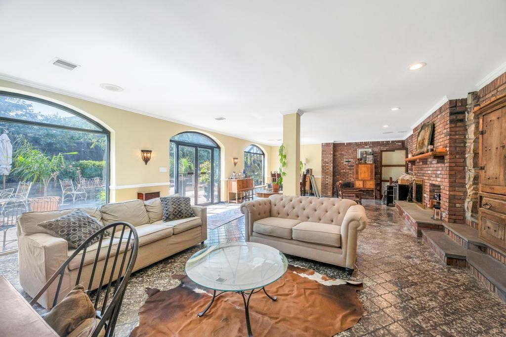 Dining room, Fireplace, Interior, Living room, Recessed Lighting, Stone Walls