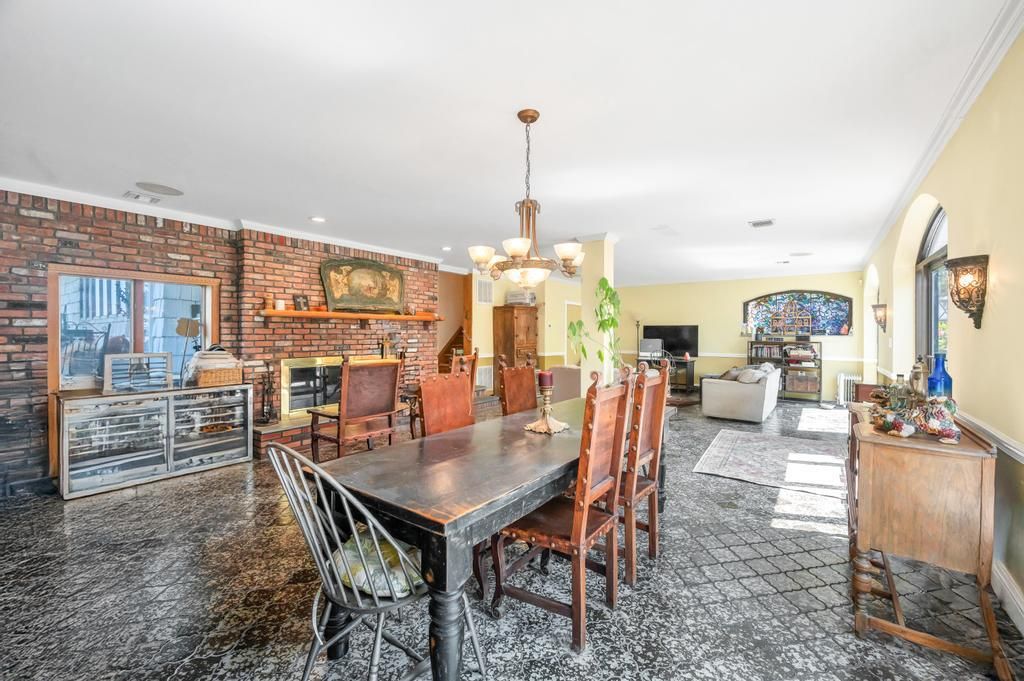 Chandelier, Dining room, Fireplace, Interior, Living room, Recessed Lighting, Stone Walls