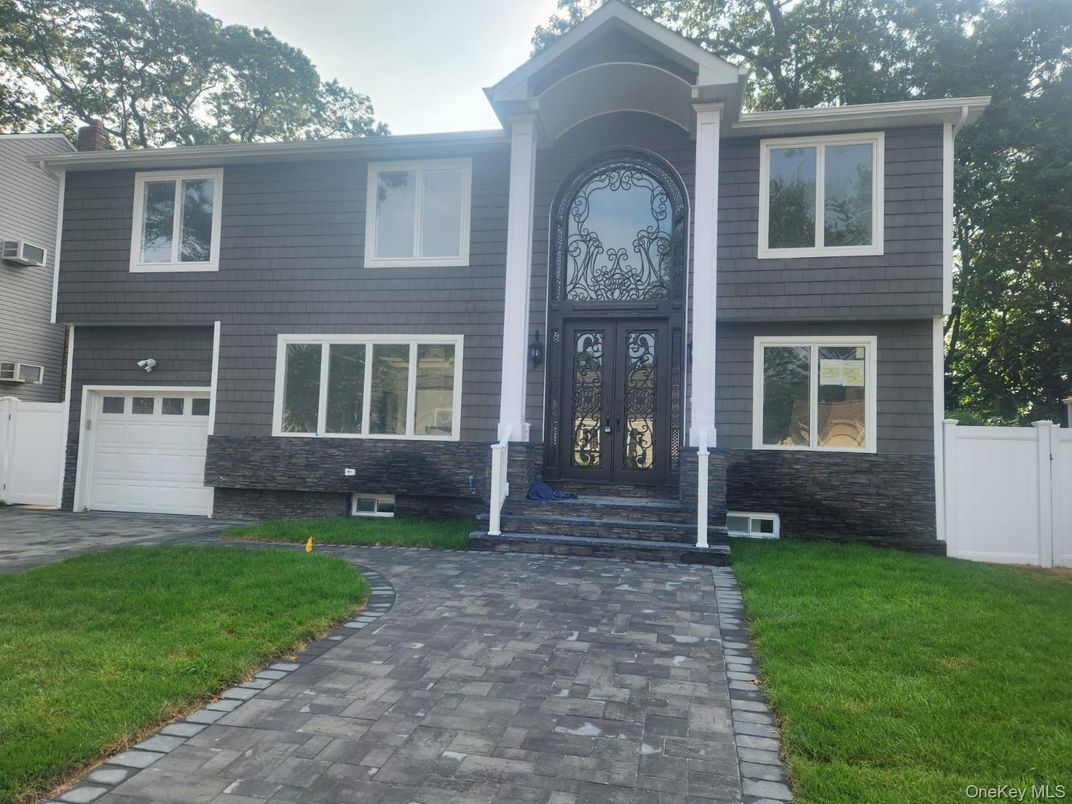 Attached, Exterior, Facade, Raised Ranch