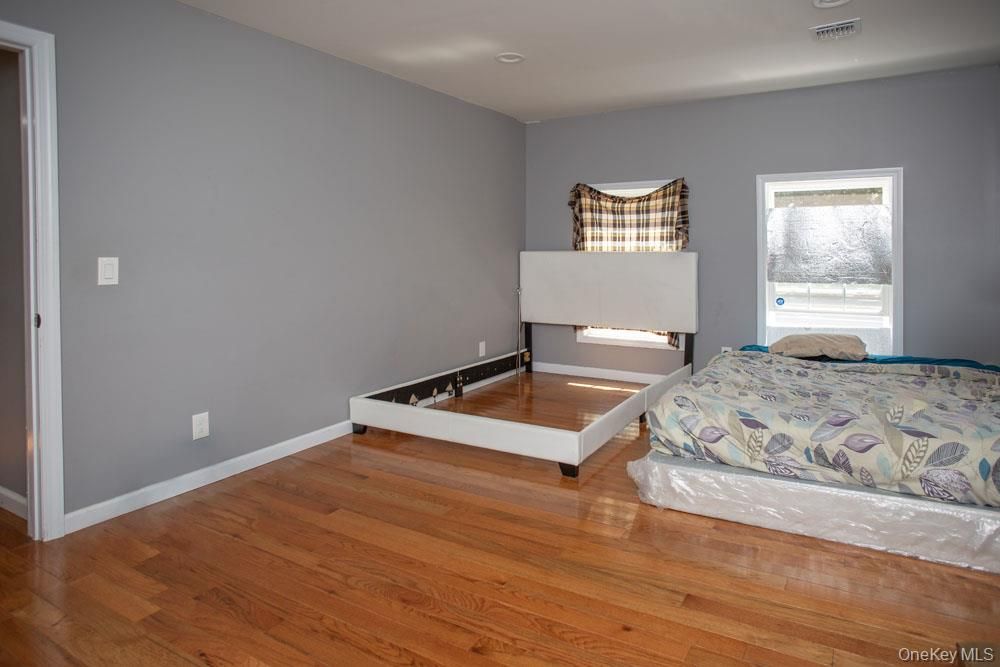 Bedroom, Fireplace, Interior, Recessed Lighting, Wood Texture Flooring