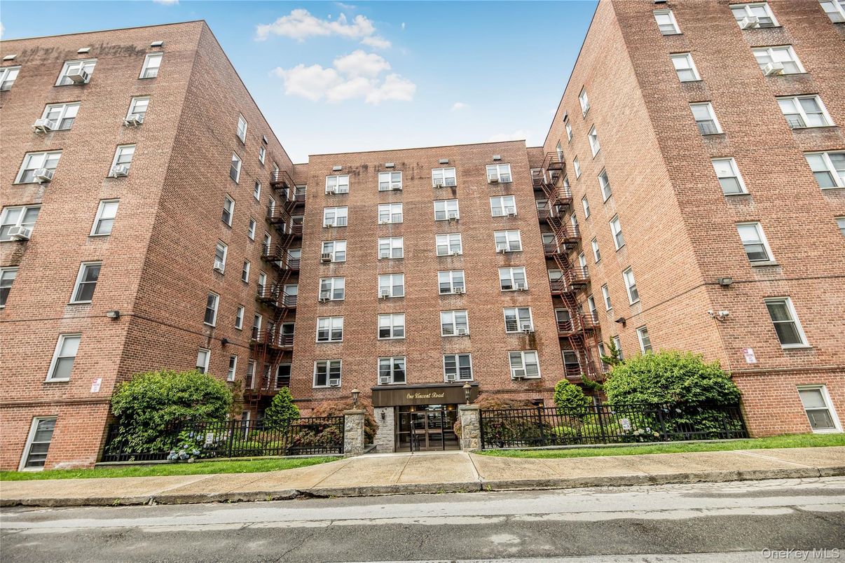 Exterior, Facade, Brick Facade, Condo Building