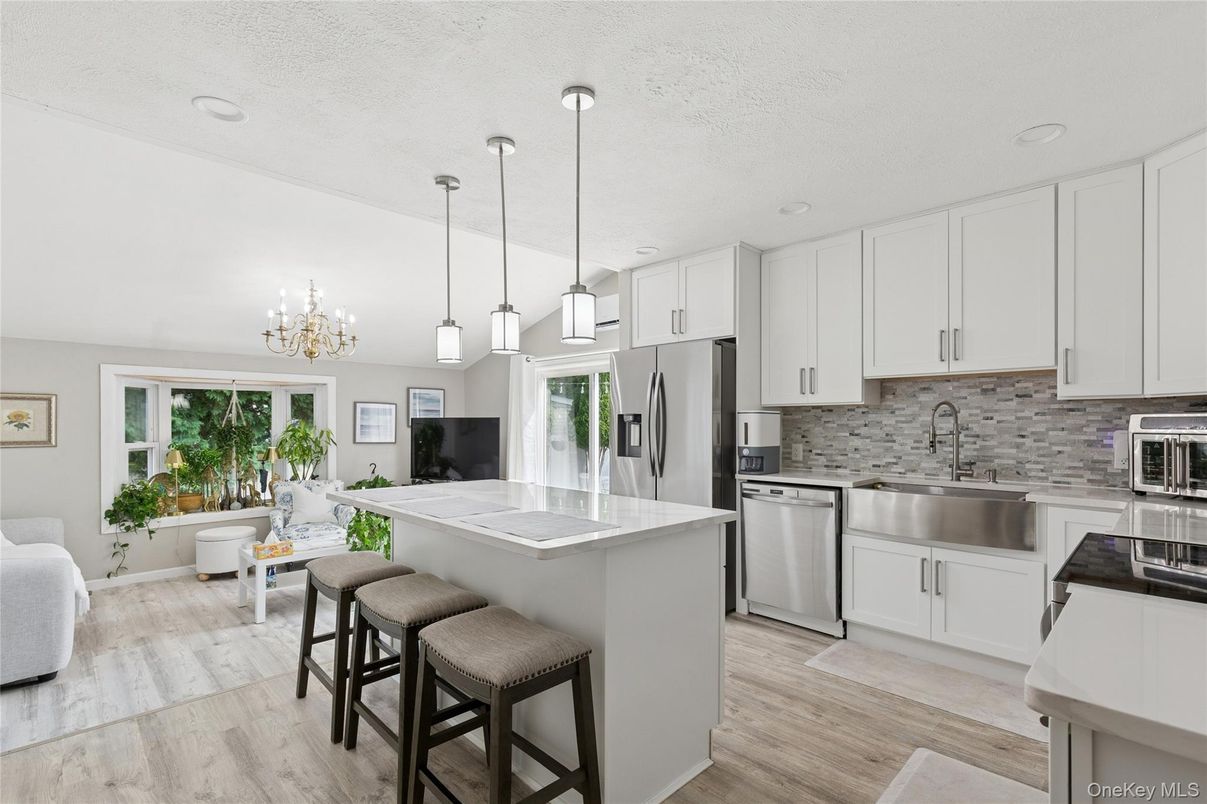 Chandelier, Interior, Kitchen, Pendant Lights, Recessed Lighting, Stainless Steel Appliances, Wood Texture Flooring