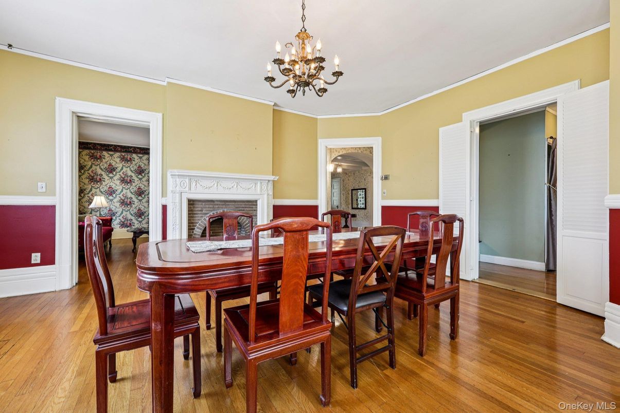 Chandelier, Dining room, Fireplace, Interior, Wood Texture Flooring