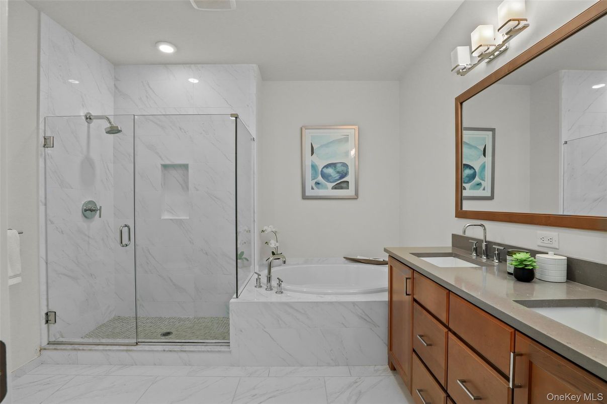 Bathroom, Dual Sink Vanities, Glass Shower, Interior, Marble, Marble Walls, Recessed Lighting
