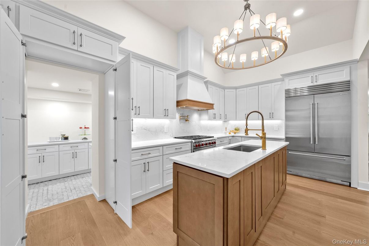 Chandelier, Interior, Kitchen, Pendant Lights, Recessed Lighting, Stainless Steel Appliances, Wood Texture Flooring