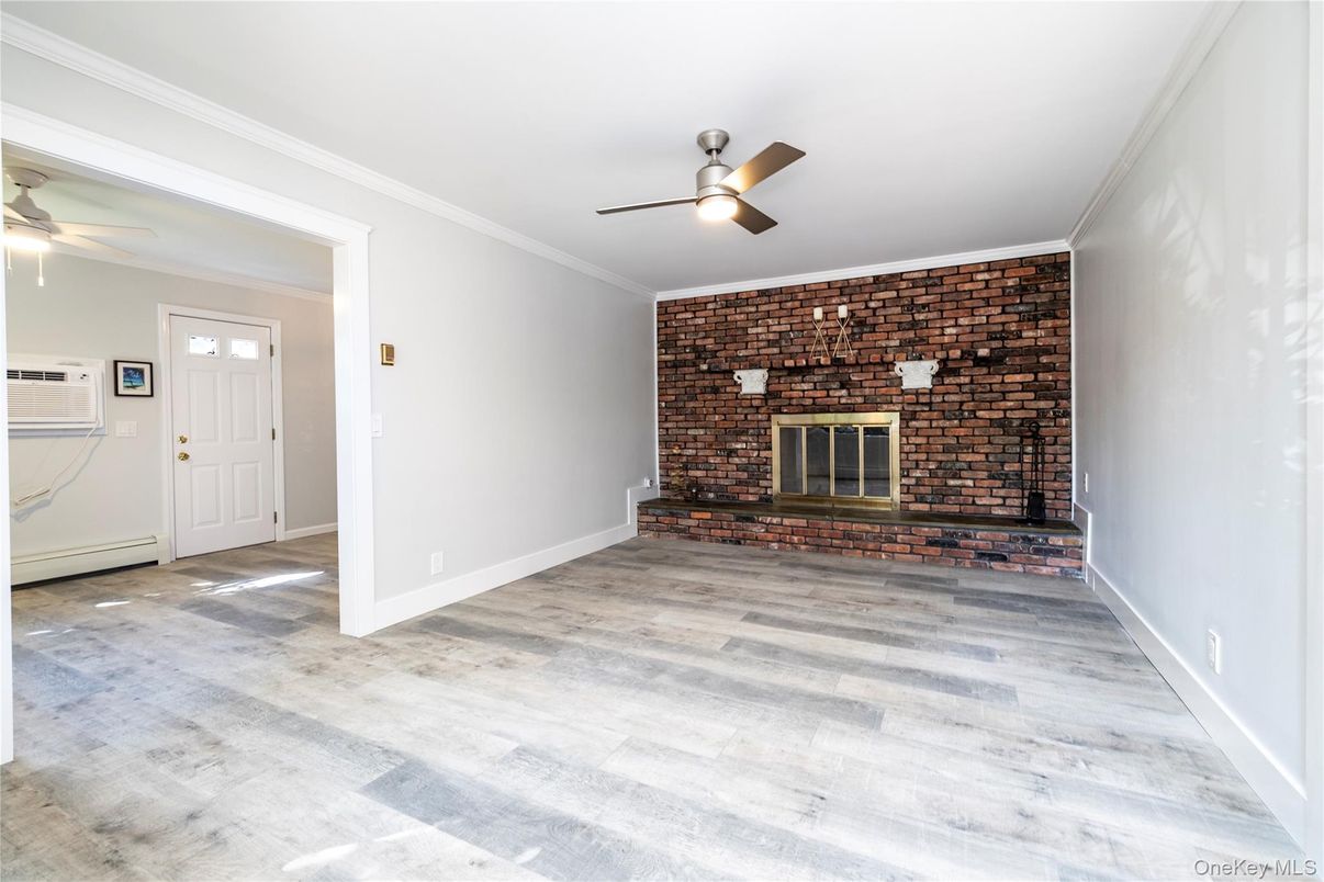 Empty room, Fireplace, Interior, Stone Walls, Wood Texture Flooring
