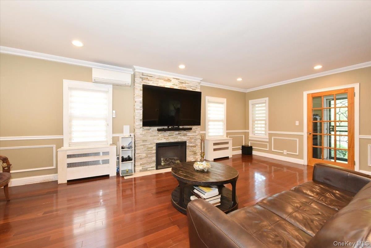 Fireplace, Interior, Living room, Recessed Lighting, Wood Texture Flooring