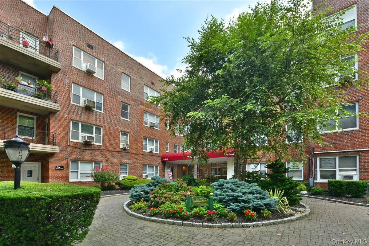 Exterior, Facade, Brick Facade, Condo Building