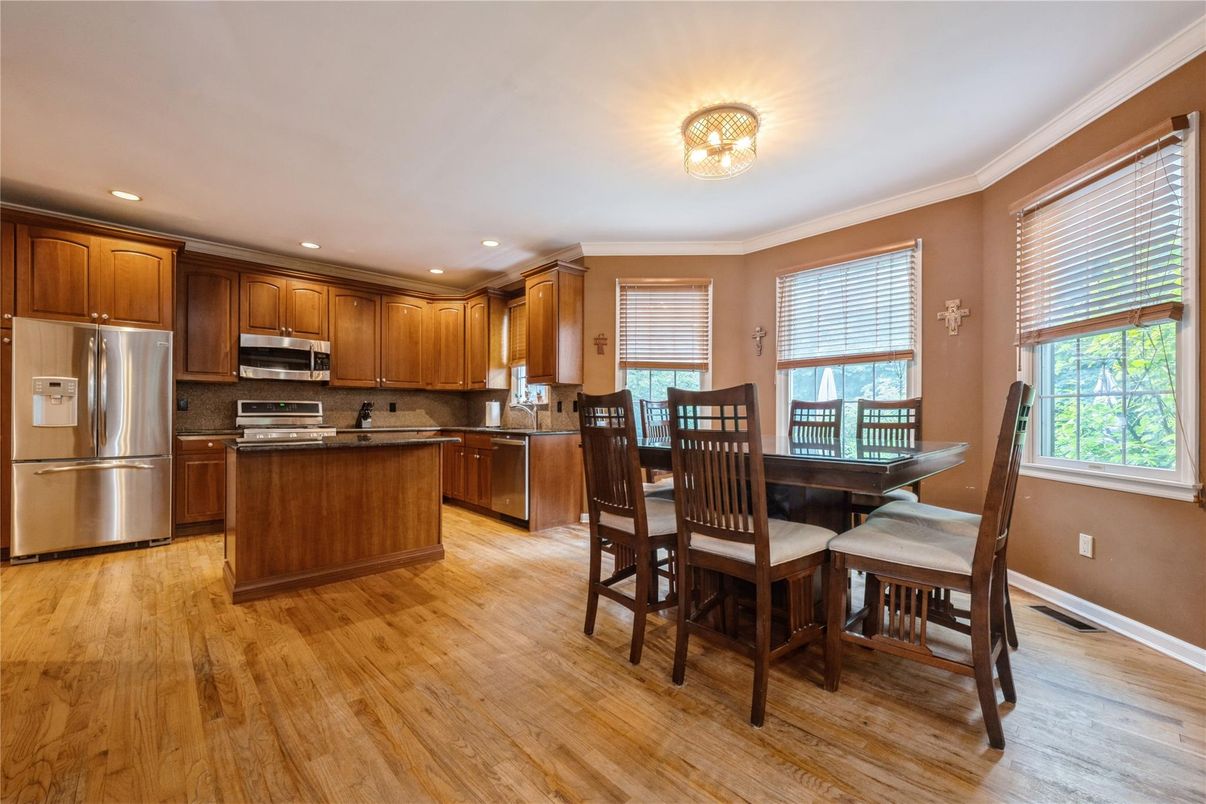 Dining room, Interior, Kitchen, Recessed Lighting, Stainless Steel Appliances, Wood Texture Flooring