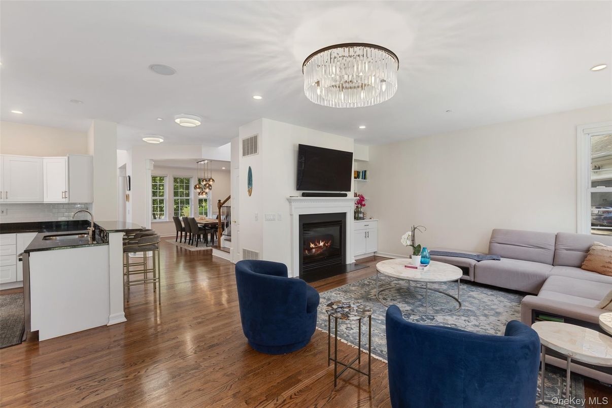 Chandelier, Dining room, Fireplace, Interior, Kitchen, Living room, Pendant Lights, Recessed Lighting, Wood Texture Flooring