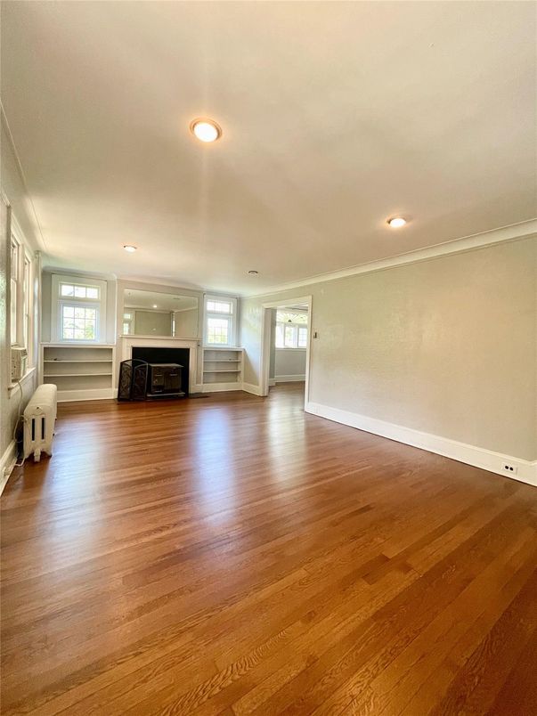Empty room, Fireplace, Interior, Recessed Lighting, Wood Texture Flooring