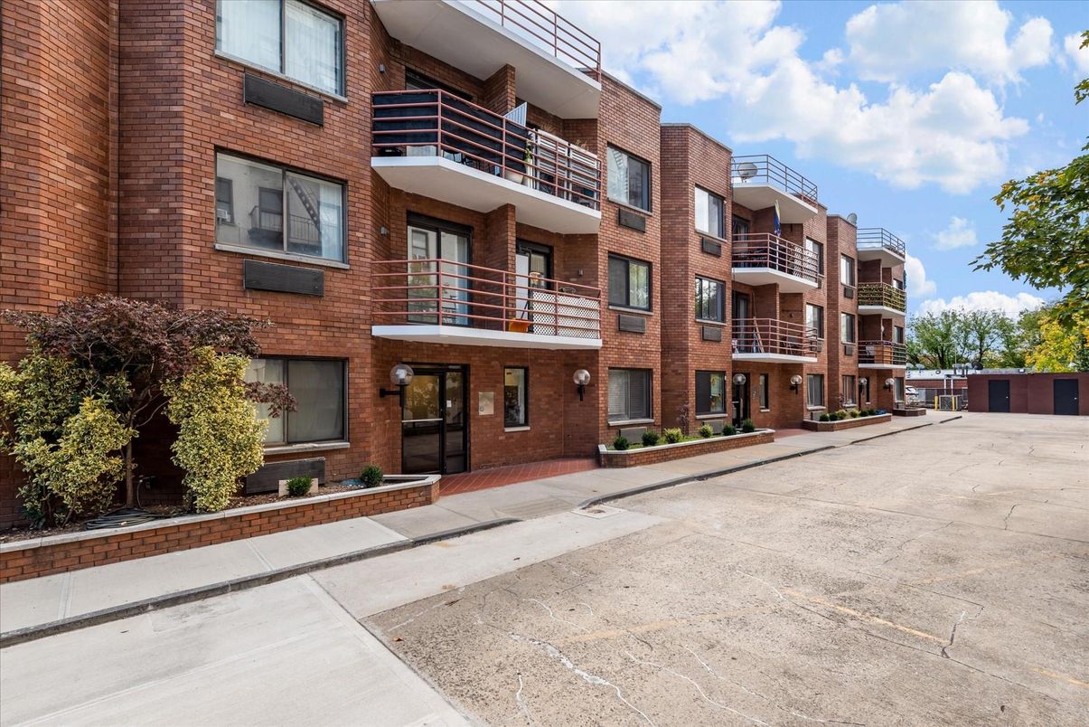 Exterior, Facade, Brick Facade, Condo Building