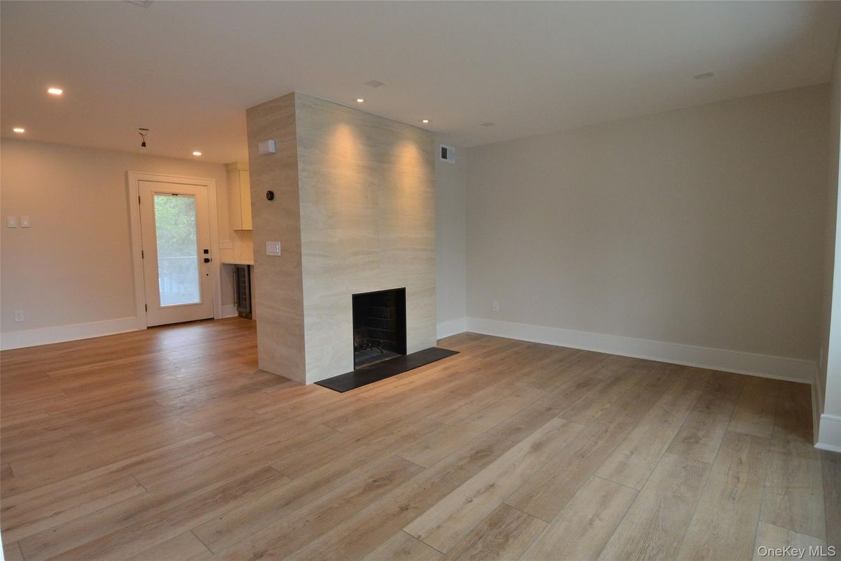 Empty room, Fireplace, Interior, Recessed Lighting, Wood Texture Flooring