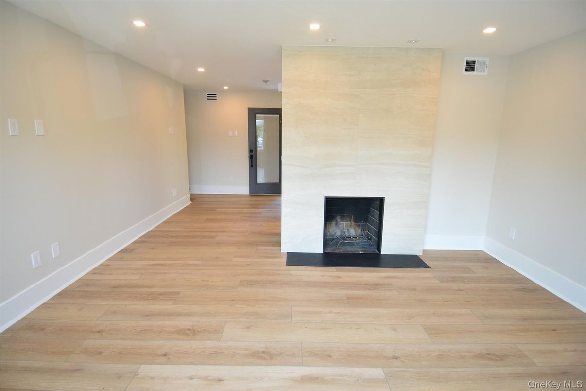 Empty room, Fireplace, Interior, Recessed Lighting, Wood Texture Flooring