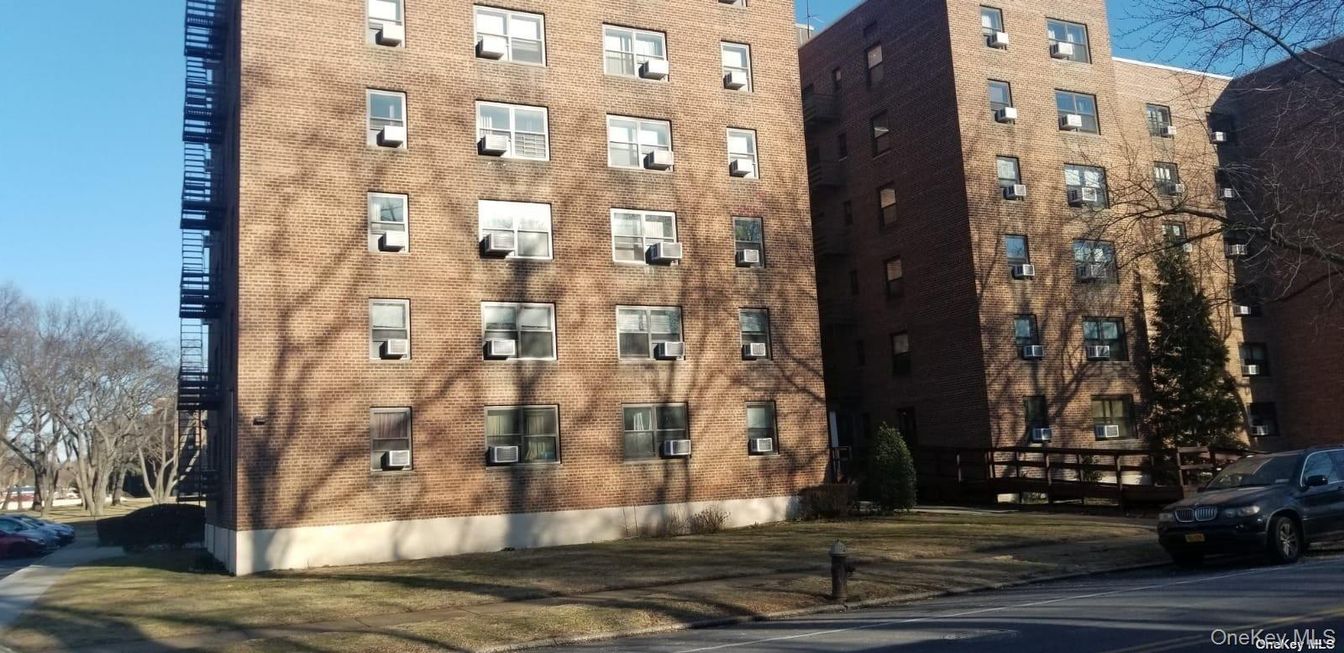 Exterior, Facade, Brick Facade, Condo Building