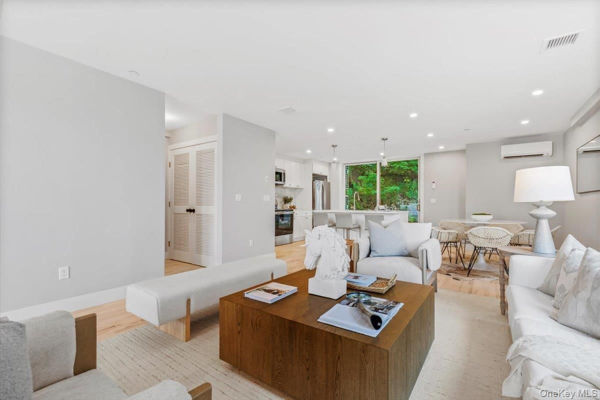 Dining room, Interior, Kitchen, Living room, Pendant Lights, Recessed Lighting, Stainless Steel Appliances, Wood Texture Flooring