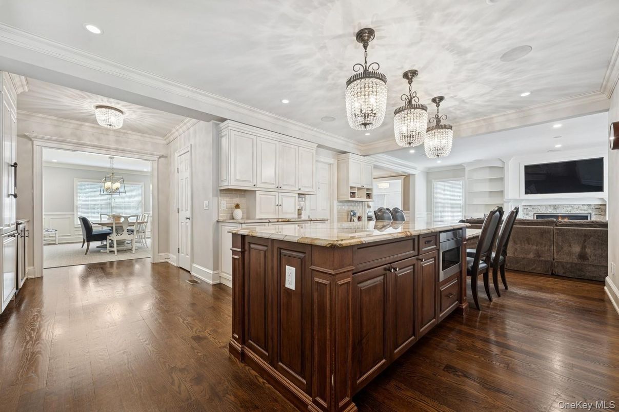 Chandelier, Dining room, Fireplace, Interior, Kitchen, Recessed Lighting, Wood Texture Flooring