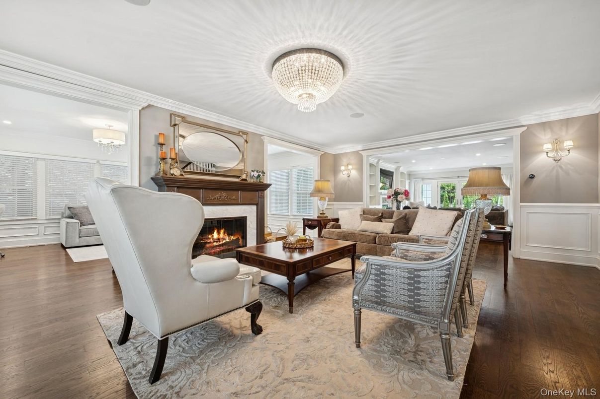 Chandelier, Fireplace, Interior, Living room, Recessed Lighting, Wood Texture Flooring