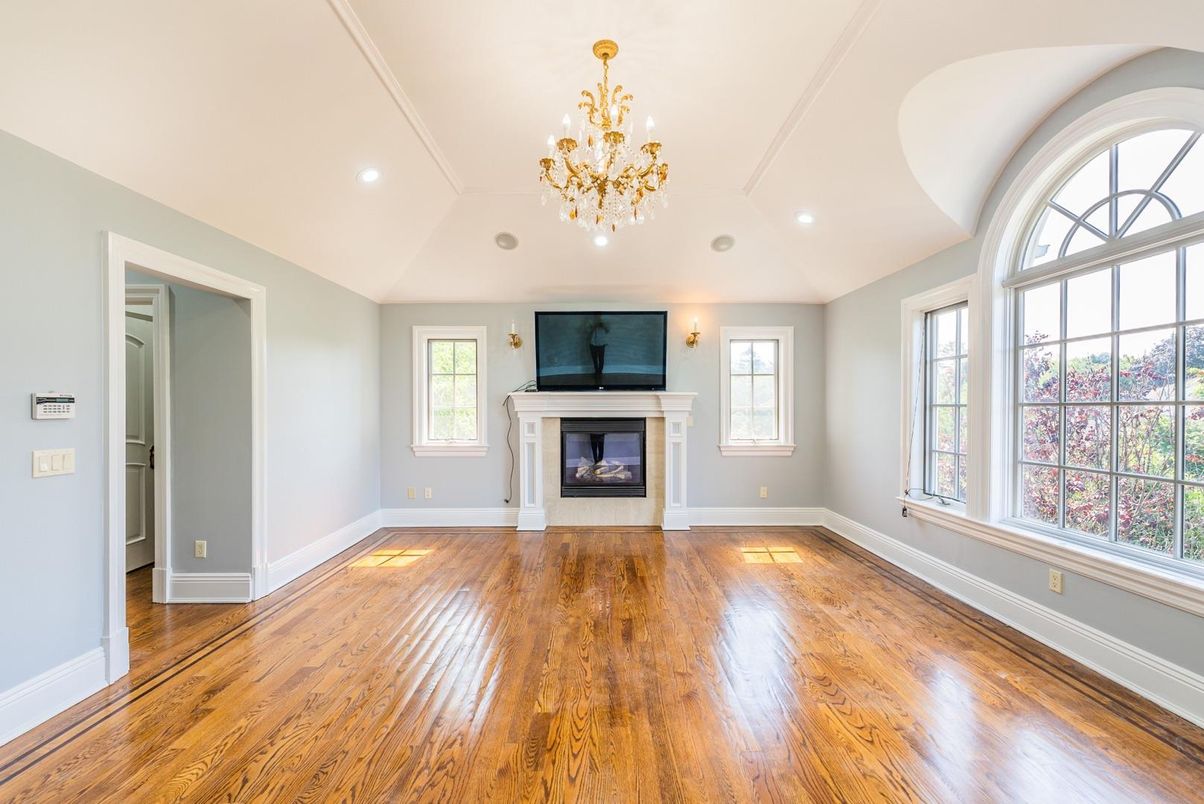 Chandelier, Empty room, Fireplace, Interior, Recessed Lighting, Wood Texture Flooring