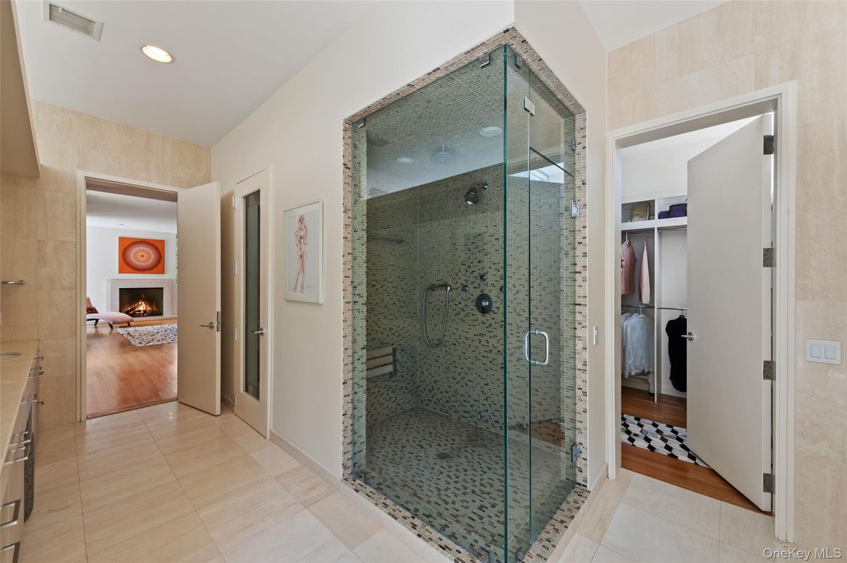 Bathroom, Fireplace, Glass Shower, Interior, Recessed Lighting, Wood Texture Flooring