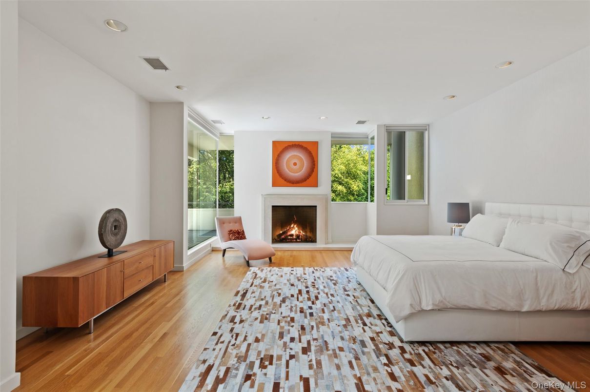 Bedroom, Fireplace, Interior, Recessed Lighting, Wood Texture Flooring